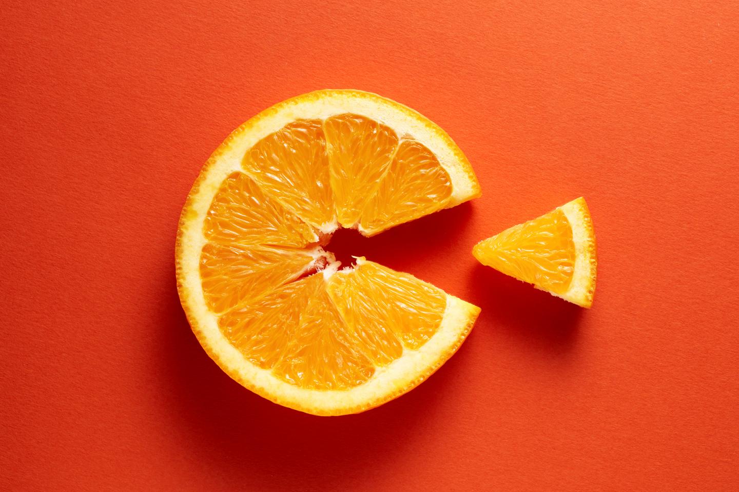 Orangenscheibe als Symbol für Vitamin C.